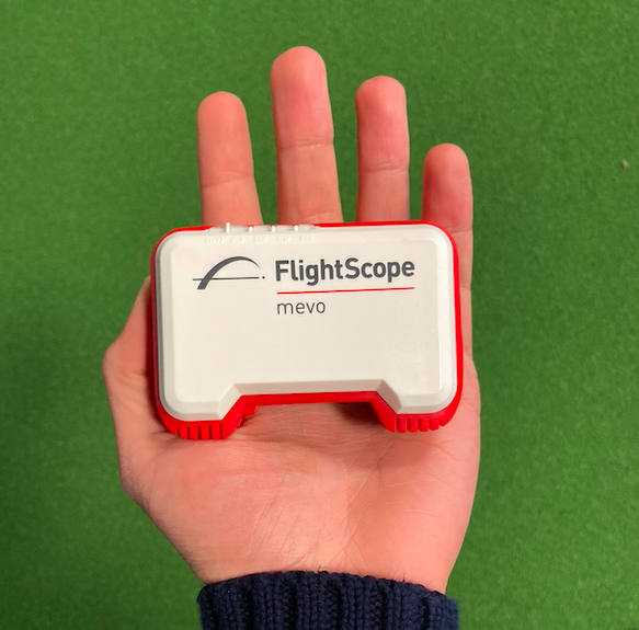 Flightscope Mevo in palm of hand
